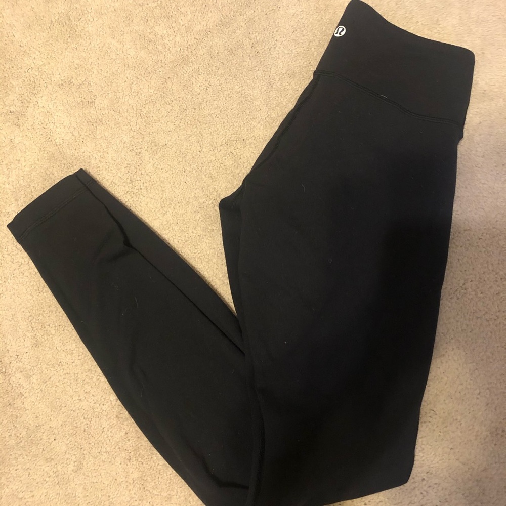 Lululemon mid-rise black leggings. Size 6.